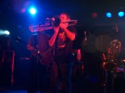Rick McRae performing with TMBG at a 2001 show. (Pic from the web site of PR Mega.)