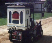 Wurlitzer Style 103 band organ, mounted on a golf cart